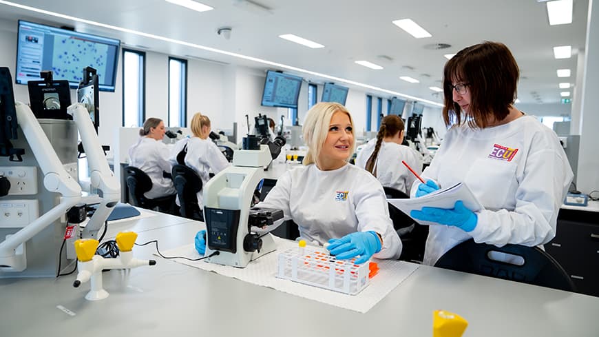 Two students in a university laboratory