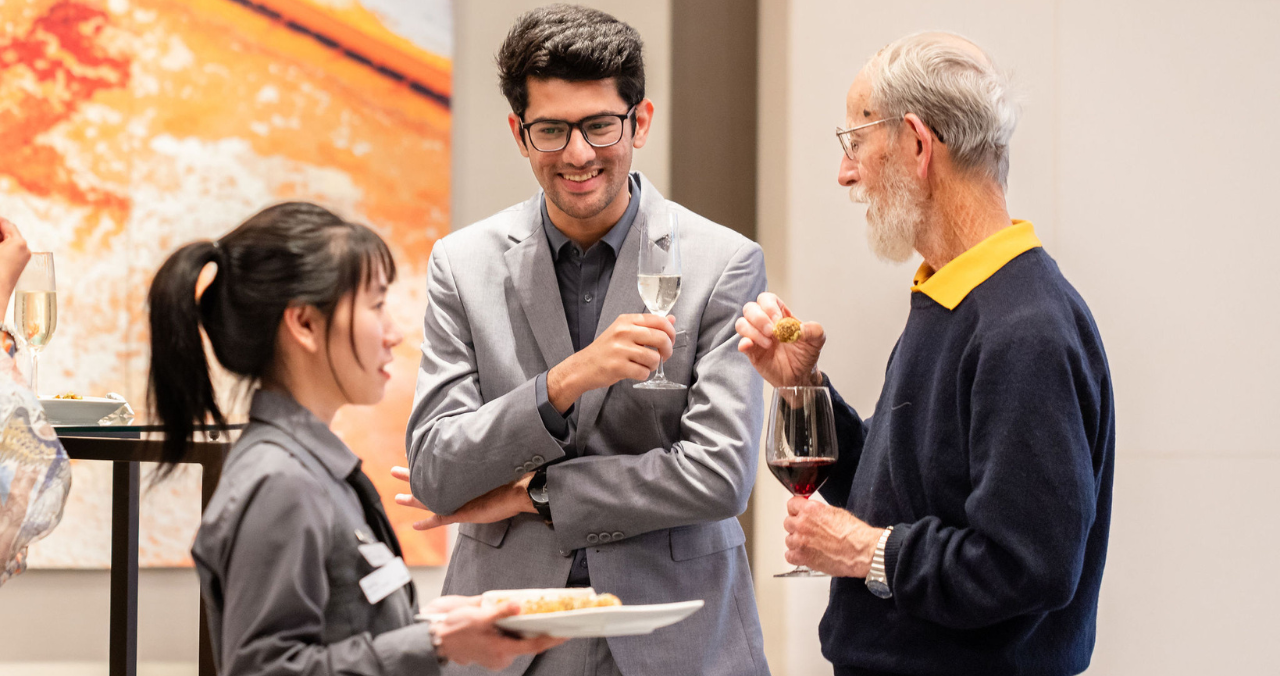 Waiter holding tray of champagne